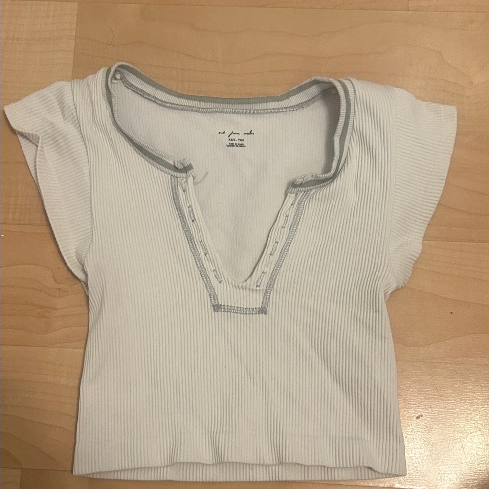 Urban Outfitters out from under crop top